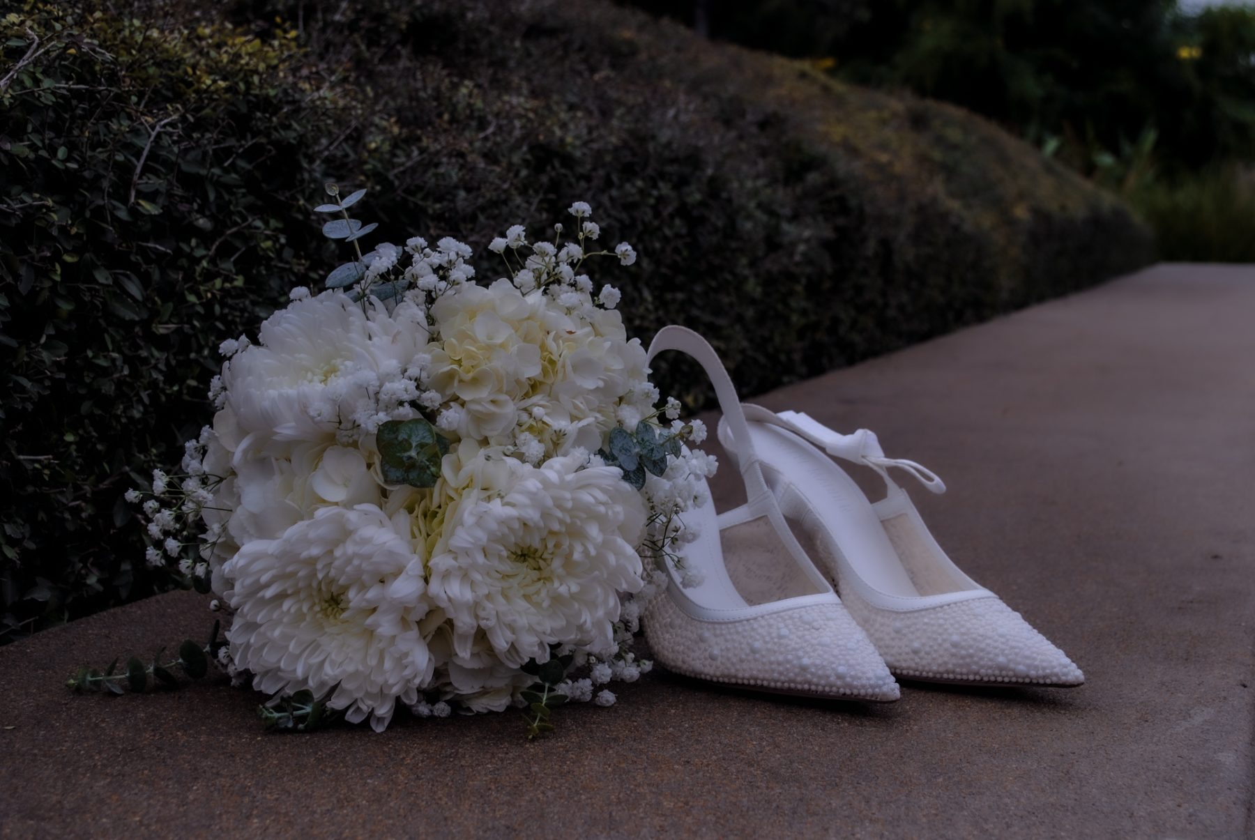 A bridal bouquet and wedding details
